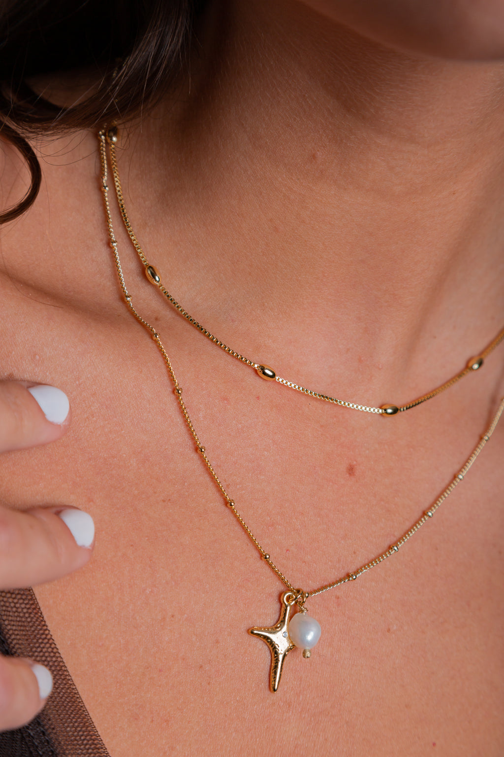 Collar Lima con cruz y perla de río – María Larraín